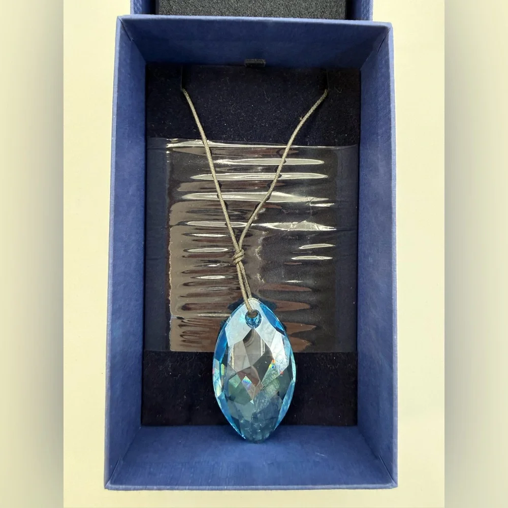 SWAROVSKI Aqua Scuro Crystal Teardrop Pendant Necklace On Black Cord-5083475
